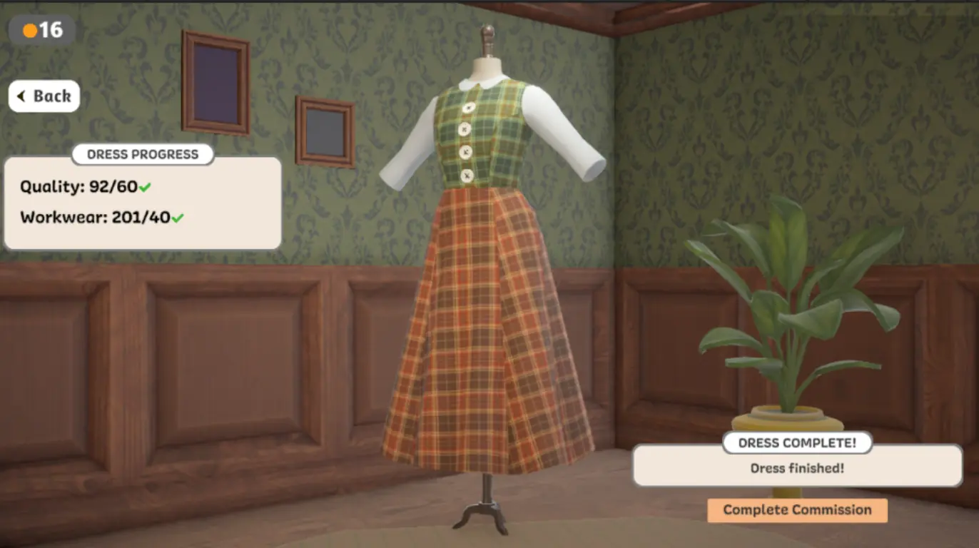 Dressmaker completed plaid dress on a mannequin