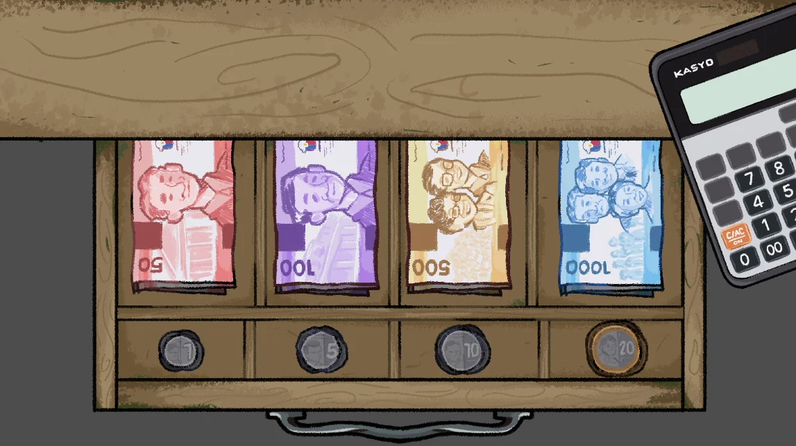 Cash drawer with Philippine peso notes, coins, and a calculator